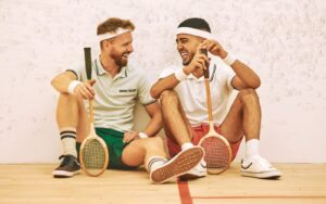Two people chatting after a game of squash