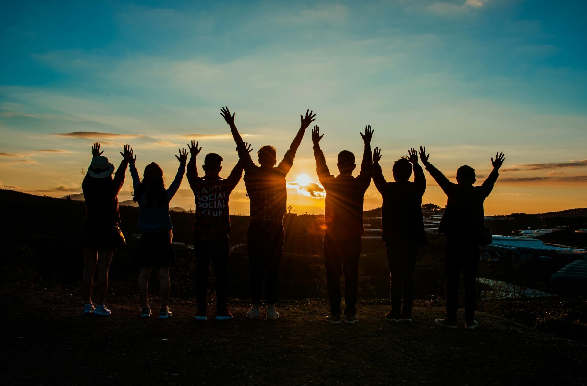 People silhouette during a sunset.